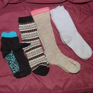 four pairs of socks will fit small to medium size feet